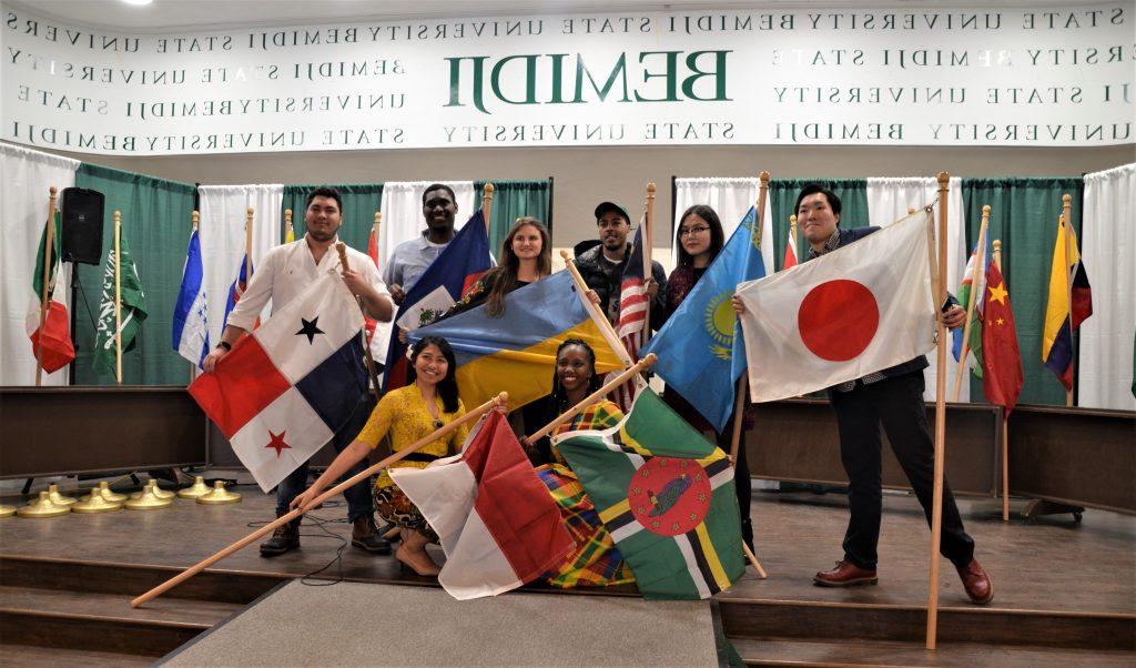 International Students holding their countries flag